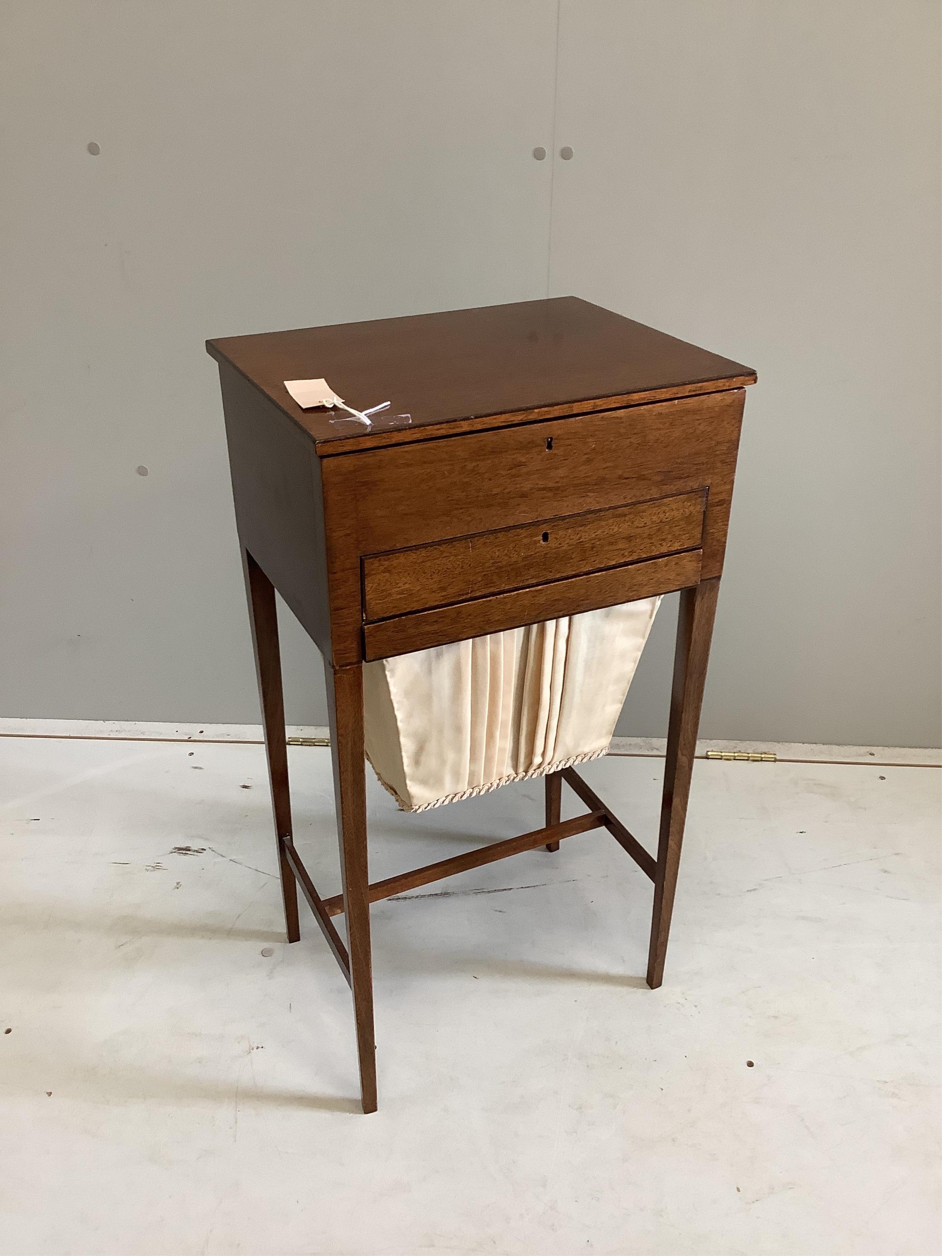 A 19th century strung mahogany sewing table, with hinged top, drawer and sewing bag, on slender square tapering legs, width 42cm, depth 32cm, height 78cm. Condition - fair